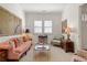 Inviting living room features a neutral palette, decorative artwork, and comfortable furnishings with plenty of natural light at 260 Hemphill Ln, Marietta, GA 30064