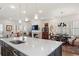 Open floorplan featuring a kitchen island with an expansive dining area and living space, perfect for entertaining at 260 Hemphill Ln, Marietta, GA 30064