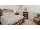 Inviting main bedroom boasts a decorative bed frame and soft natural light at 260 Hemphill Ln, Marietta, GA 30064
