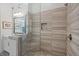 Stylish walk-in shower featuring decorative tiles and a built-in niche for toiletries at 260 Hemphill Ln, Marietta, GA 30064