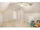 Bright bedroom features a ceiling fan and neutral walls ready for personal touches at 8000 Abington Dr, Locust Grove, GA 30248