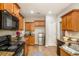 Well-equipped kitchen with granite countertops, stainless steel appliances, and ample cabinet space at 8000 Abington Dr, Locust Grove, GA 30248