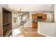 Bright kitchen and breakfast area with wood cabinets, granite countertops, and stainless steel appliances at 8000 Abington Dr, Locust Grove, GA 30248