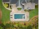 Aerial view of backyard pool, patio, and landscaping adjacent to the house at 581 Fairfield Nw Rd, Atlanta, GA 30327