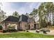 Picturesque backyard featuring a pool, lush greenery, and a patio area, perfect for outdoor living at 581 Fairfield Nw Rd, Atlanta, GA 30327