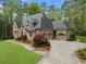 Expansive brick home with a three-car garage and beautifully landscaped grounds at 581 Fairfield Nw Rd, Atlanta, GA 30327