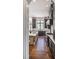 Well-equipped kitchen featuring gray cabinets, a central island, and modern fixtures at 581 Fairfield Nw Rd, Atlanta, GA 30327