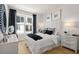 Inviting bedroom with natural light, stylish decor, and a calming atmosphere at 201 New St # 2207-1, Decatur, GA 30030