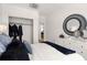 Serene bedroom featuring an accent mirror, neutral tones, and a walk-in closet at 201 New St # 2207-1, Decatur, GA 30030