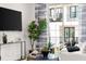 Cozy living room with a comfortable seating area and access to a private balcony at 201 New St # 2207-1, Decatur, GA 30030