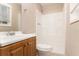 Bathroom featuring a shower over tub with a shower head and a vanity sink at 3759 Rosemary Se Ln, Conyers, GA 30013