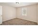 Bedroom with neutral carpet and natural lighting at 3759 Rosemary Se Ln, Conyers, GA 30013