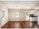 Bright dining area boasting wood flooring and ample natural light at 3759 Rosemary Se Ln, Conyers, GA 30013