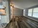 Bright living room showcasing an open floor plan and abundant natural light from large windows at 5559 John Burruss Rd, Cumming, GA 30040