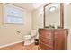 A traditional bathroom featuring a classic vanity and modern fixtures at 1830 Greystone Ct, Marietta, GA 30068