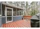 An outdoor porch with wood flooring, string lights, and outdoor seating at 1830 Greystone Ct, Marietta, GA 30068