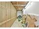 Unfinished storage room featuring multiple storage closets and concrete floor at 1830 Greystone Ct, Marietta, GA 30068