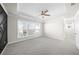 Bedroom featuring carpet flooring, recessed lighting, and geometric accent wall at 2028 Holtz Ln, Atlanta, GA 30318