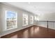 Upstairs area with large windows and wood floors at 2028 Holtz Ln, Atlanta, GA 30318