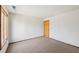 Bedroom with neutral carpeting, bright windows, and natural lighting at 566 Hickory Hills Ct, Stone Mountain, GA 30083