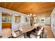 Dining area featuring stylish furnishings and adjacent spaces that include kitchen and living areas at 566 Hickory Hills Ct, Stone Mountain, GA 30083