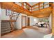 Spacious dining room features wood ceiling, tile flooring, and a nearby door leading to the outside at 566 Hickory Hills Ct, Stone Mountain, GA 30083