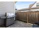 Backyard patio with a stainless steel grill and a fenced yard at 108 Brighton Blvd, Woodstock, GA 30188