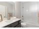 Modern bathroom featuring subway tile shower and tub, a white sink, and modern fixtures at 108 Brighton Blvd, Woodstock, GA 30188