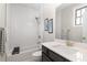 Bright bathroom featuring a tub and shower, with modern subway tile, a large mirror and vanity with storage at 108 Brighton Blvd, Woodstock, GA 30188