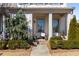 Inviting front porch with seating area and charming landscaping at 108 Brighton Blvd, Woodstock, GA 30188