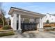 Community mailboxes under a decorative shelter, enhanced by landscaping and a welcoming entrance at 108 Brighton Blvd, Woodstock, GA 30188