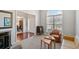 Elegant living room with light neutral colors, with large window, hardwood floors and comfortable seating at 214 White Cloud Run, Canton, GA 30114