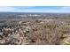 Panoramic aerial view showcasing the neighborhood's scenic landscape and mountain views at 2499 E Maddox Rd, Buford, GA 30519