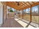 Charming back porch featuring a ceiling fan and ample sunlight, perfect for enjoying the outdoors at 3640 Hickory Se Cir, Smyrna, GA 30080