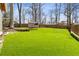 Green backyard with a shed at 3640 Hickory Se Cir, Smyrna, GA 30080