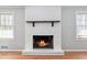 Living room fireplace with beautiful mantle and brickwork at 3640 Hickory Se Cir, Smyrna, GA 30080