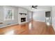 Bright living room with hardwood floors and a charming fireplace at 3640 Hickory Se Cir, Smyrna, GA 30080