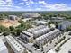 An aerial view of modern townhomes in a desirable community with lush greenery at 201 New St # 2301, Decatur, GA 30030