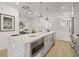Contemporary kitchen with stainless steel appliances and a functional island at 201 New St # 2301, Decatur, GA 30030