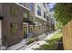 Charming brick townhomes with well-maintained landscaping and inviting entranceways at 201 New St # 2301, Decatur, GA 30030