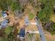 The aerial view shows a house and the nearby tree-filled residential neighborhood at 3063 Kerr Dr, Decatur, GA 30034