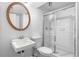Bathroom featuring stylish sink, toilet, shower, and decor at 3063 Kerr Dr, Decatur, GA 30034