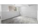 Bedroom with neutral gray carpet and natural light from one double window at 3063 Kerr Dr, Decatur, GA 30034