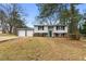 Charming split level home with a two car garage and mature trees at 3063 Kerr Dr, Decatur, GA 30034