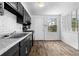 Bright kitchen features modern appliances, stylish cabinets, and hardwood floors at 3063 Kerr Dr, Decatur, GA 30034