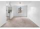 Bright living room with a large window and neutral carpeting at 3063 Kerr Dr, Decatur, GA 30034