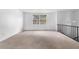 Spacious living room with a large window and neutral carpeting at 3063 Kerr Dr, Decatur, GA 30034