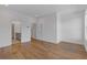 Spacious bedroom with hardwood floors and access to the bathroom at 201 New St # 2305-1, Decatur, GA 30030
