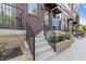 Brick townhomes feature a clean and modern design with black metal railings and awning at 201 New St # 2305-1, Decatur, GA 30030
