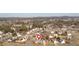 A home is marked by a pin on a hilltop neighborhood surrounded by trees and other houses at 37 Village Dr, Cartersville, GA 30121